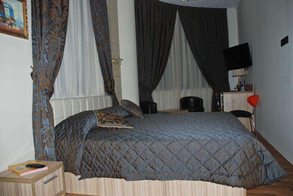 Hotel Comfort Tirana Habitación foto